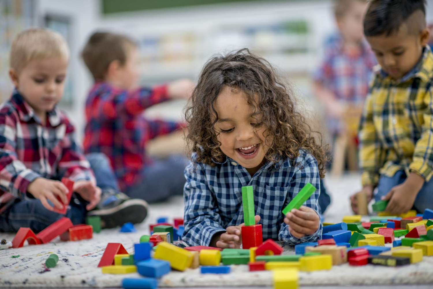 Children learning and playing happily at ABC Joy Family Daycare